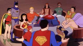 Super Friends meeting around a table